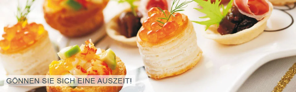 Bild von Fingerfood als Close-Up mit dem Slogan: Gönnen Sie sich eine Auszeit!